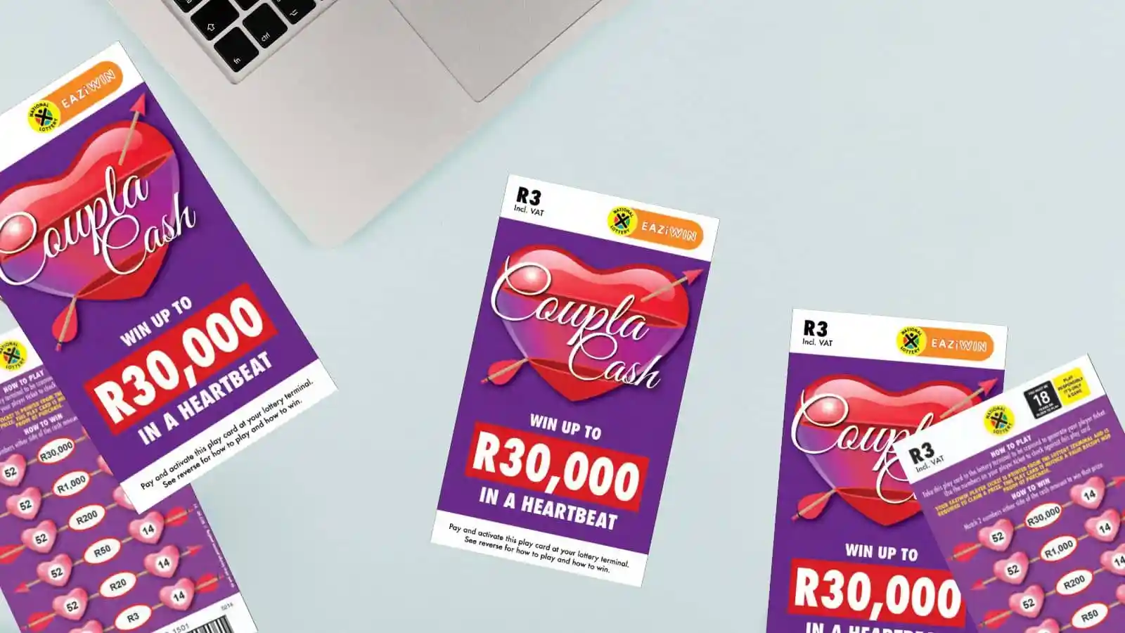 Coupla Cash scratch cards and receipts on office light color surface