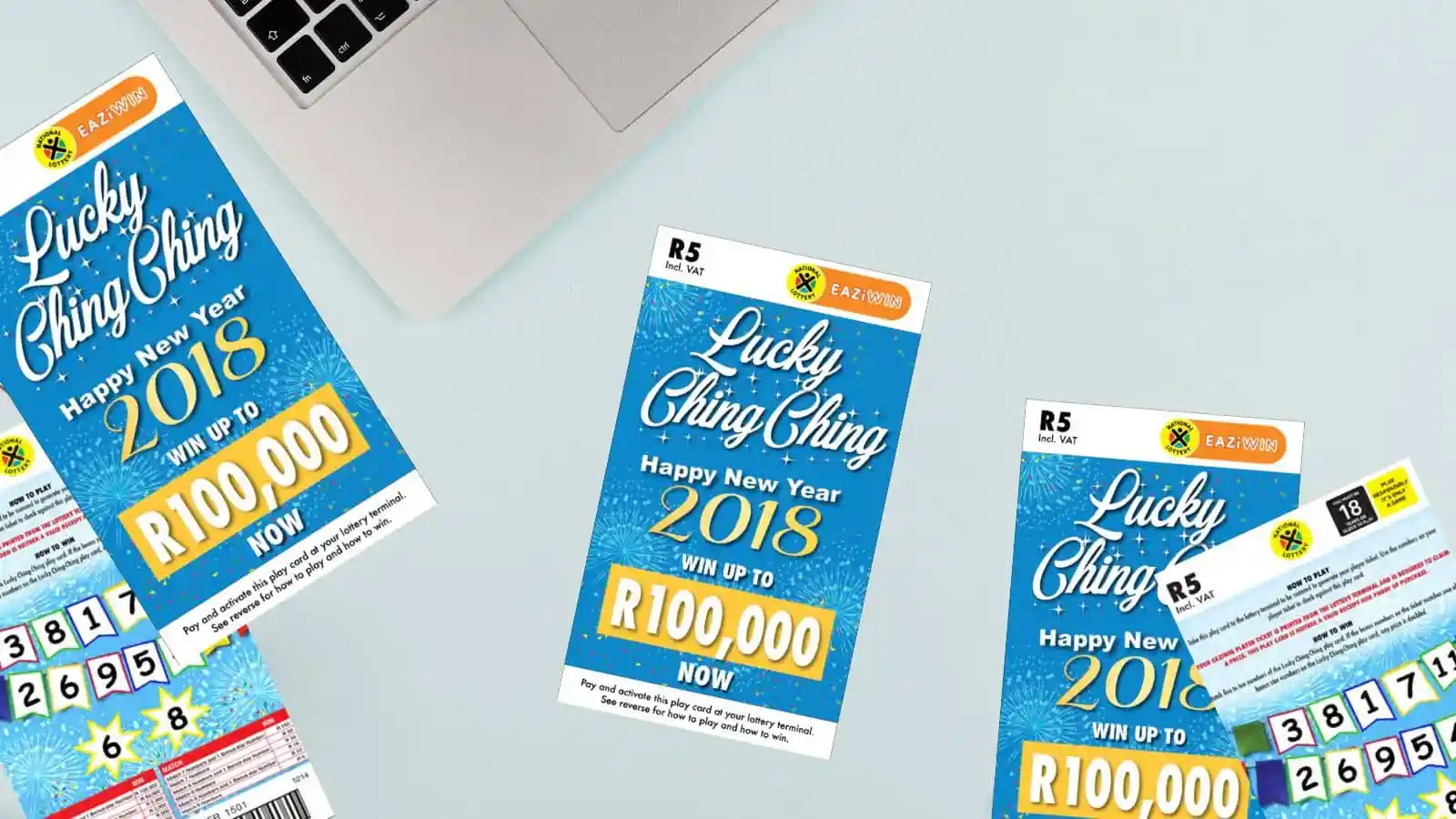 Lucky Ching Ching scratch cards and receipts on office light color surface