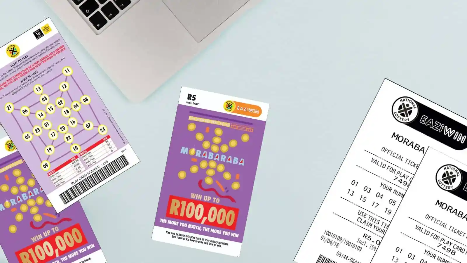 Morabaraba scratch cards and receipts on office light color surface