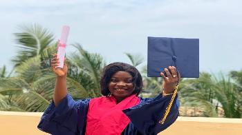 african woman who graduated school