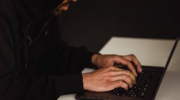 a man hacking the personal computer