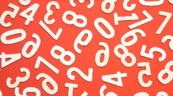 many different white numbers on the red background