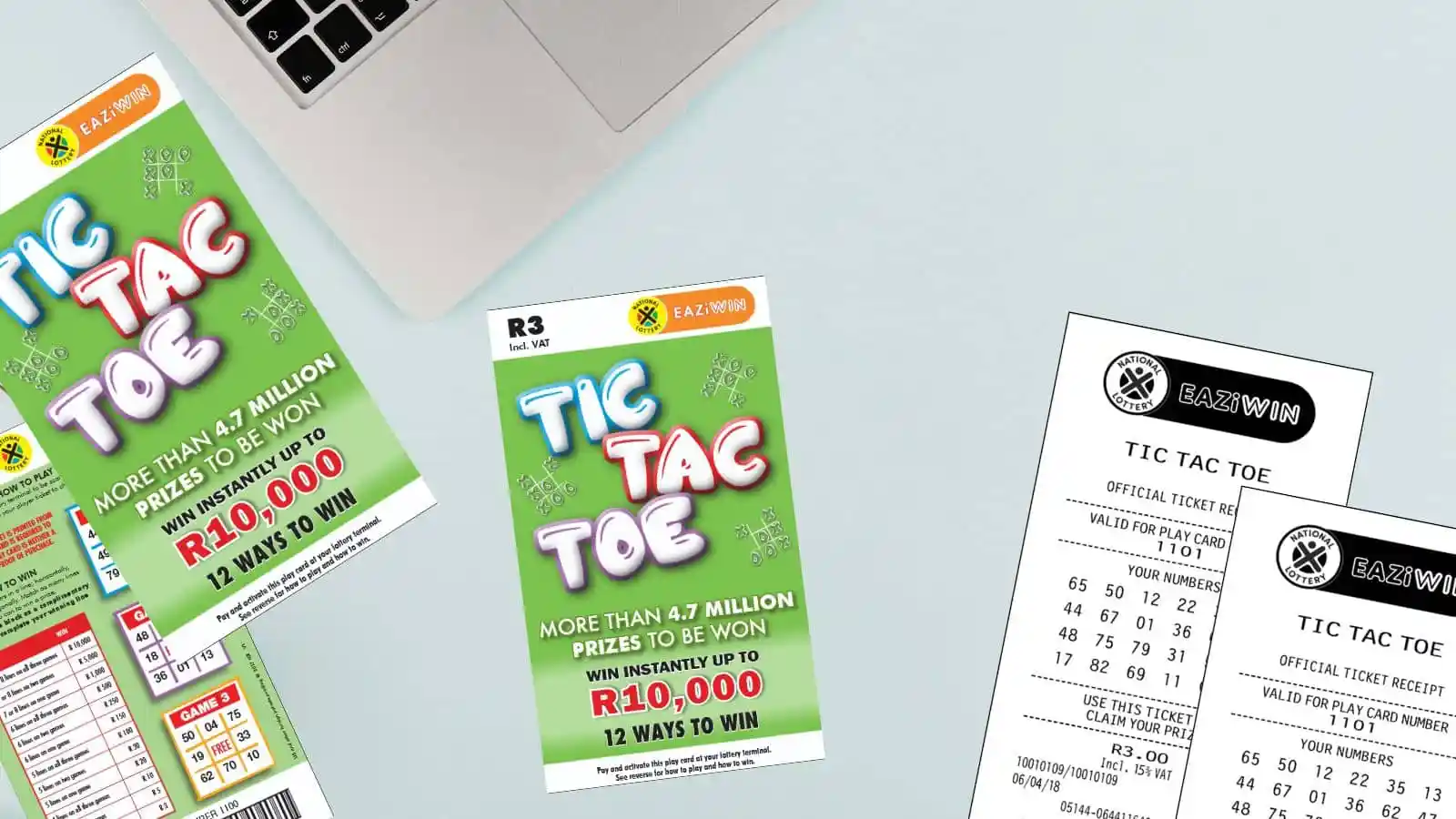 Tic Tac Toe scratch cards and receipts on office light color surface