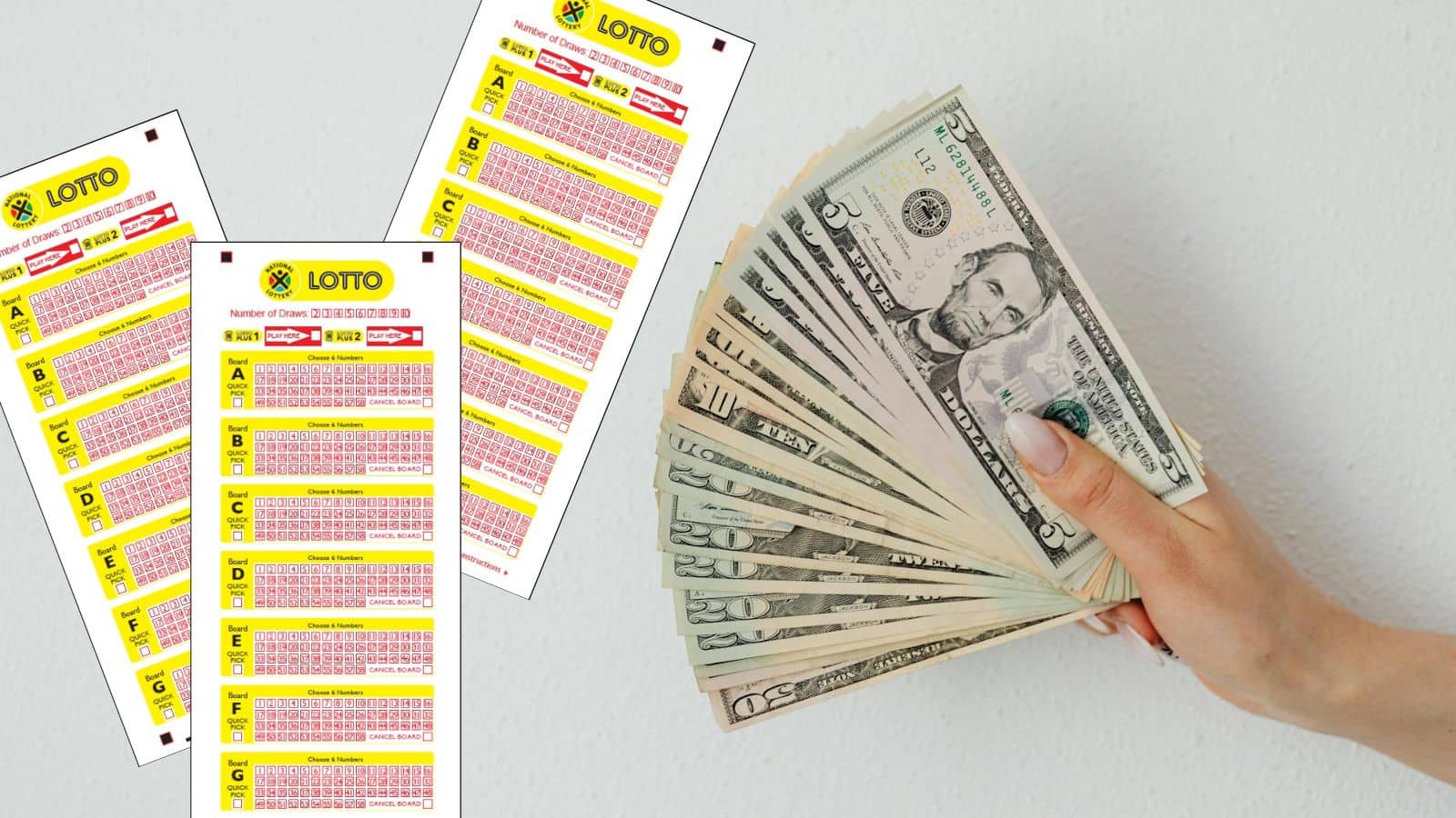 lotto tickets and money held by hand